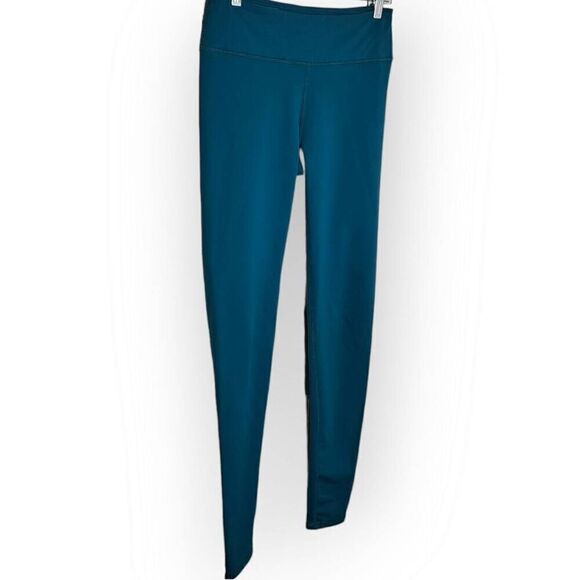 Fabletics Women's 7/8 Mid Rise Compression Legging Zipper Back Pocket in Teal si - Picture 2 of 6